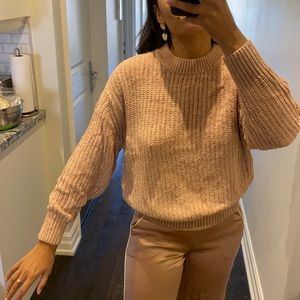 Rose coloured velvet knit Aritzia sweater.